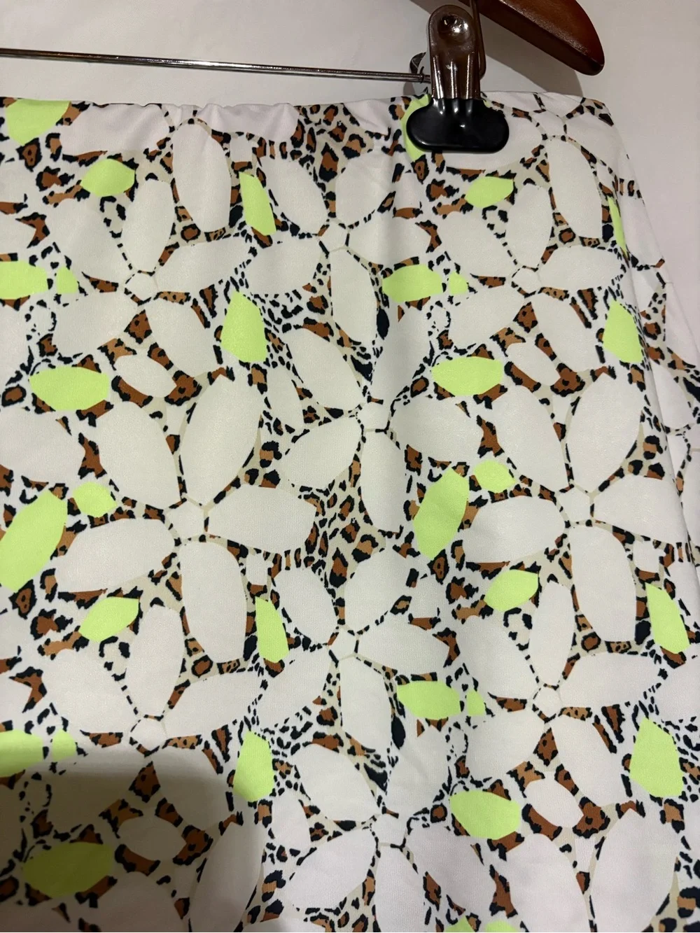 Cross court Floral Cutout Tennis Skort in White with Neon Yellow Accents